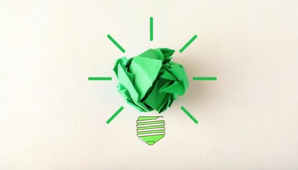 Obraz premium Innovative Green Energy Concept Art: Crumpled Green Paper Shaped Like a Lightbulb with Abstract Radiating Lines Highlighting Eco Ideas