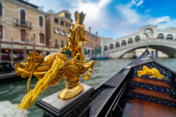 Venetian Gondola with Golden Decoration Near Rialto Bridge