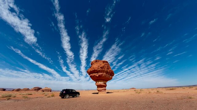 Time lapse of clouds over big mushroom rock in Tabuk, Saudi Arabia.
