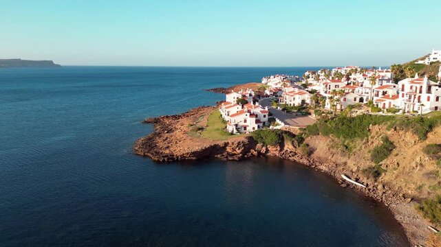 The white houses of the Fornells district, along the coast of Menorca