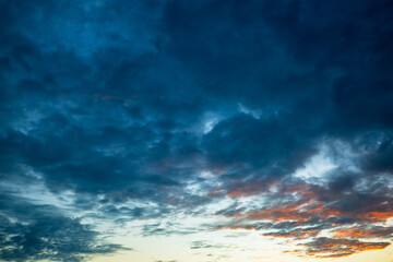 Clouds and blue sky background,Ideal for Sky replacement project: Panoramic, colorful pink-orange-blue dramatic sky with clouds illuminated by red sunset, aerial photography, far
