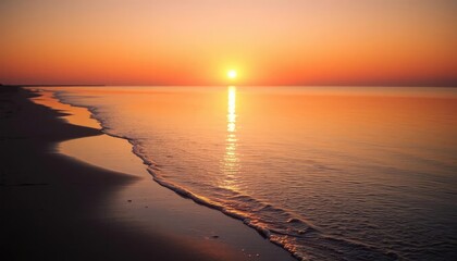 Fototapeta premium Sunrise over tranquil beach shoreline