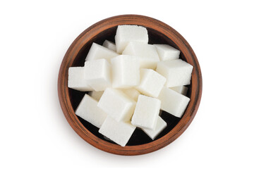 Sugar cubes in a ceramic bowl isolated on white background. Top view. Flat lay