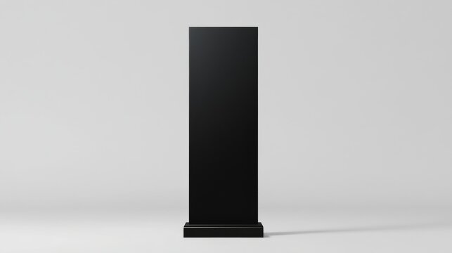 Black Vertical Sign Stands on Simple Base Against White Background.