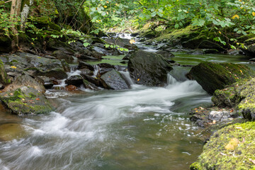 Long exposure of a waterfall on the East Lyn river at Watersmeet in Exmoor National Park