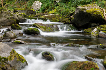 Long exposure of a waterfall on the East Lyn river at Watersmeet in Exmoor National Park