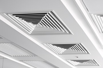 Obraz premium Modern White Ceiling Air Vents Architectural Detail HVAC System Square Design Clean Lines