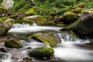 Long exposure of a waterfall on the East Lyn river at Watersmeet in Exmoor National Park