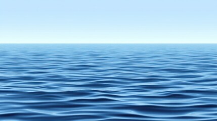 Obraz premium Calm ocean surface with a clear blue sky.