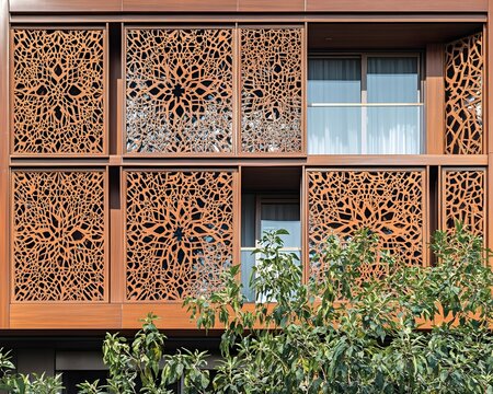 Modern building with intricate laser-cut wood facade and geometric patterns