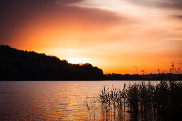 sunset over lake in kashubia