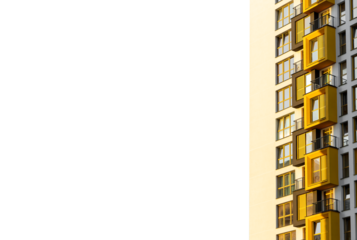 Modern residential building facade. Urban condo block with yellow balconies and multiple windows, showcasing contemporary architecture. Perfect for real estate, property development, and city living.