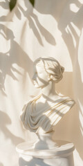 Elegant Marble Bust in Sunlit Shadows with Draped Fabric Background