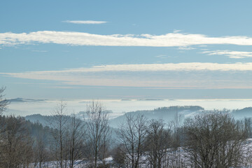 Blue winter day with inversion in valleys near Roprachtice village