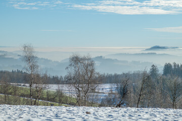 Blue winter day with inversion in valleys near Roprachtice village