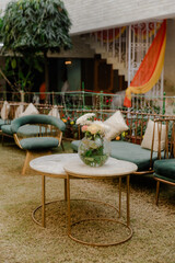 Wedding reception, table setting and celebration event with flower arrangement, decor and catering for a romantic setting. Party, luxury restaurant or fancy place with cutlery