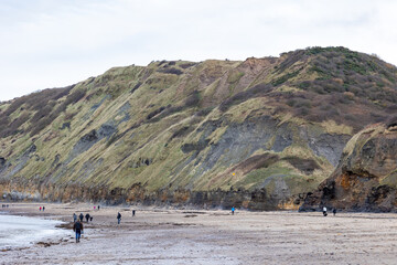 Colourful cliffs at Runswick Bay in Yorkshire on a winter day