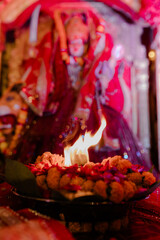 An Indian wedding ritual filled with vibrant traditions, including sacred fire ceremonies, floral garlands, and heartfelt blessings, symbolizing love, unity, and cultural heritage