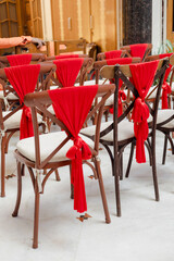 Wedding reception, table setting and celebration event with flower arrangement, decor and catering for a romantic setting. Party, luxury restaurant or fancy place with cutlery