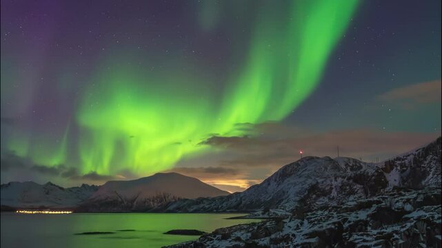 Tromso Norway time lapse of the aurora borealis northern lights winter landscape at Rorvikneset Sommaroy