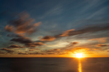A long exposure of a spectacular sunrise in Punta Cana, Dominican Republic
