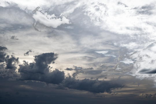 Sky only with dark to light clouds and patchy transparency
