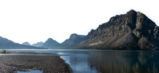 Panorama of rocky mountain scene with reflection in calm lake sky transparent
