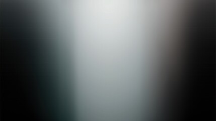 A blurred image with light gradients and indistinct shapes.