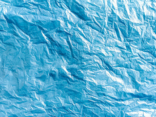 Obraz premium blue crumbled plastic bag texture background .