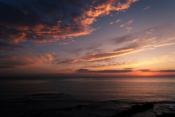Sunset in the sea in orange tones, Sardinia