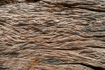 Texture antique oak furniture,rustic grain and retro design, showcases a natural wooden surface, highlighted by rough patterns, cracks, and the timeless charm of vintage timber, old background.