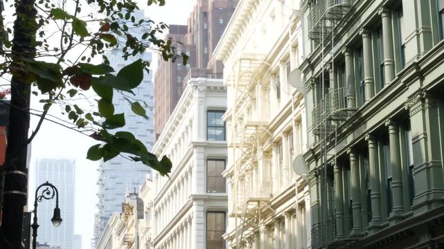New York City Manhattan Soho fashion district near Broadway street. USA urban building facade, old american architecture. Shopping in NYC, United States. Business and residential real estate. Lantern