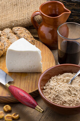 Gofio, queso blanco y vaso de vino tinto de las islas Canarias