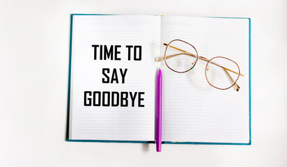 TIME TO SAY GOOD in the diary on a gray background