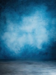 Dusty blue blurred background for portrait. Portrait backdrop for studio. Empty textured wall.