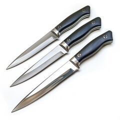 Fototapeta premium Three sleek kitchen knives with black handles and sharp blades, arranged neatly on a white background.
