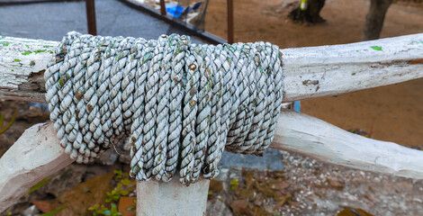 nice amazing closeup detailed view of a loop rope on old wooden fence