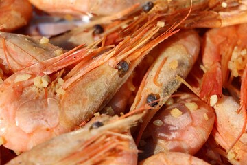close up of freshly smoked king prawns ready to serve