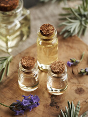 Lavender essential oil in three glass bottles