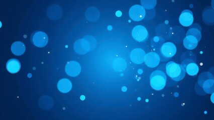Bright blue bokeh lights creating festive atmosphere on dark background