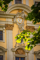Partial View of the Main Building of Schloss Ludwigsburg (Ludwigsburg Palace) with Royal Emblem on a sunny Summer Day; Close-up