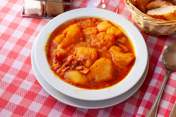 Braised squid with potatoes. High quality photo