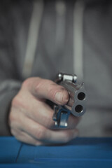 Man take care of two barrel derringer personal handgun caliber .38 special