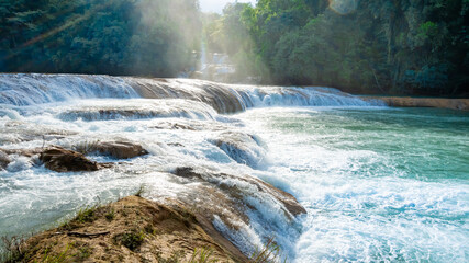 Landsape of Agua Azul with waterfalls in the Tropical forest of Palenque in Mexico.  