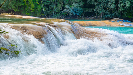 Landsape of Agua Azul with waterfalls in the Tropical forest of Palenque in Mexico.  