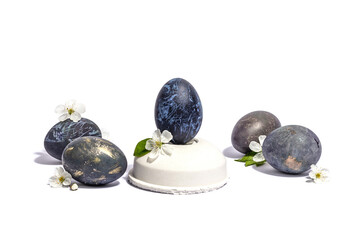 Easter egg on a beton stand isolated on white background. Traditional symbol, blooming cherry
