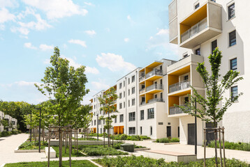 Cityscape of a residential area with modern sustainable apartment buildings, new green urban landscape in the city