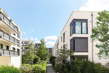 Cityscape of a residential area with modern sustainable apartment buildings, new green urban landscape in the city