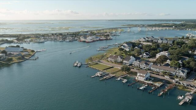 High aerial flyover of downtown Beaufort, North Carolina and waterfront.