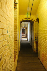 San Francisco, CA, USA. April 24, 2012: Narrow brick hallway with arched ceilings in San Francisco.